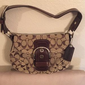 Authentic Coach soho buckle in signature jacquard.