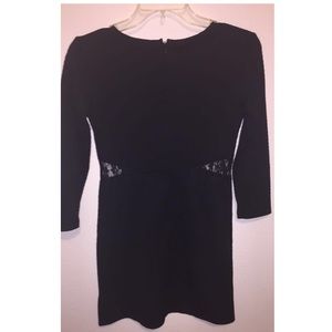 Black dress with see through sides on the waist