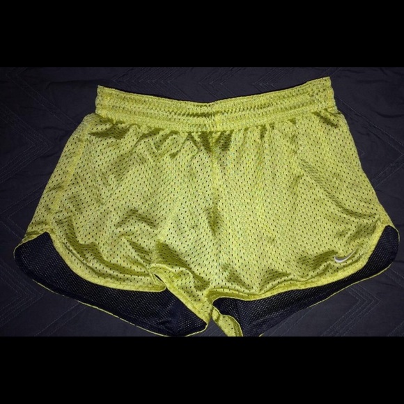Yellow mesh Nike shorts