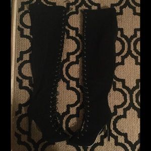 Thigh high lace up boots