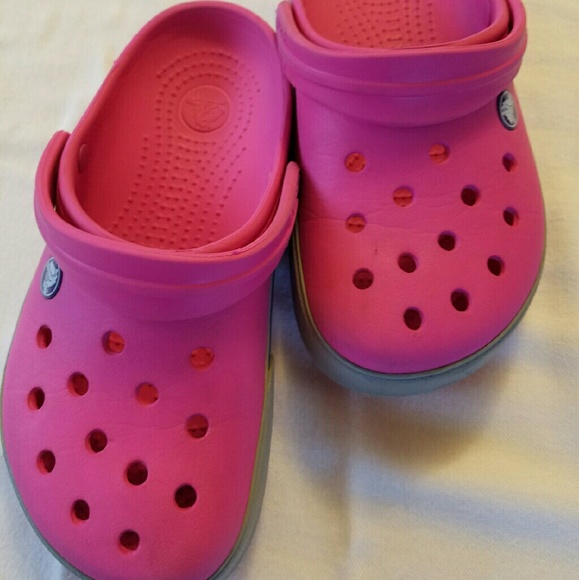 Girls clogs by Crocs .