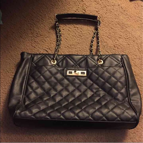 Black handbag with gold chains