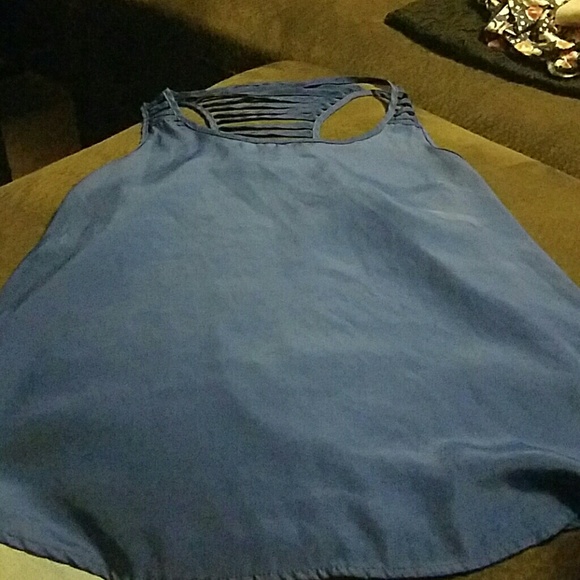 A dark blue shirt with cutouts