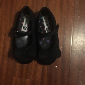 Black strapped flats