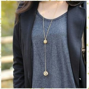 Gold 2 hollow balls on chain