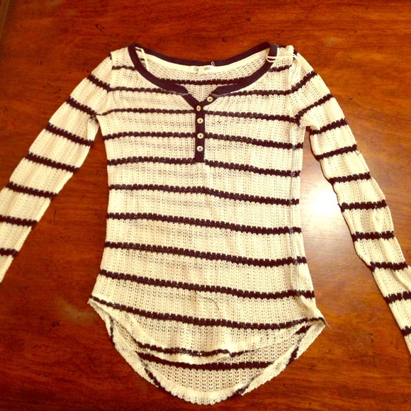 I am selling a dark blue and white long sleeve.