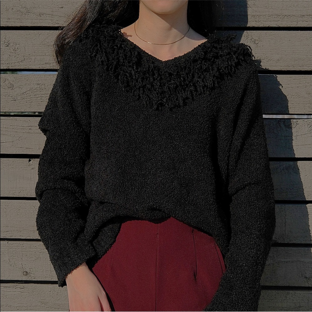 Fuzzy sweater with unique necklines