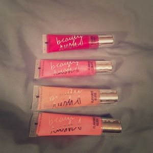 Four brand new Victoria secret lip glosses