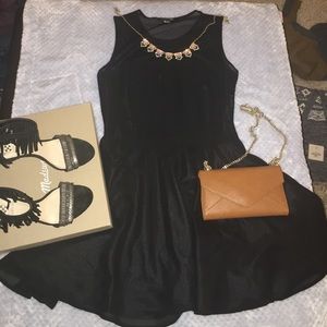 Pleated black swing dress