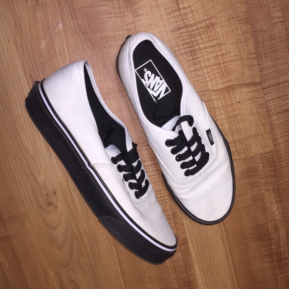 White & Black Vans. Men's 7 / Women's 8.5