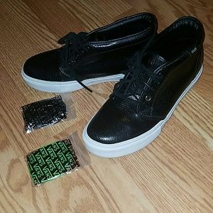 vans high tops black on feet vans high tops black on feet