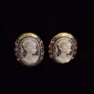 Brass tone cameo earrings.