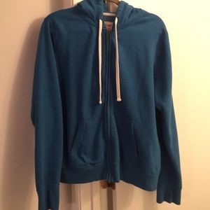 Blue zip-up sweater