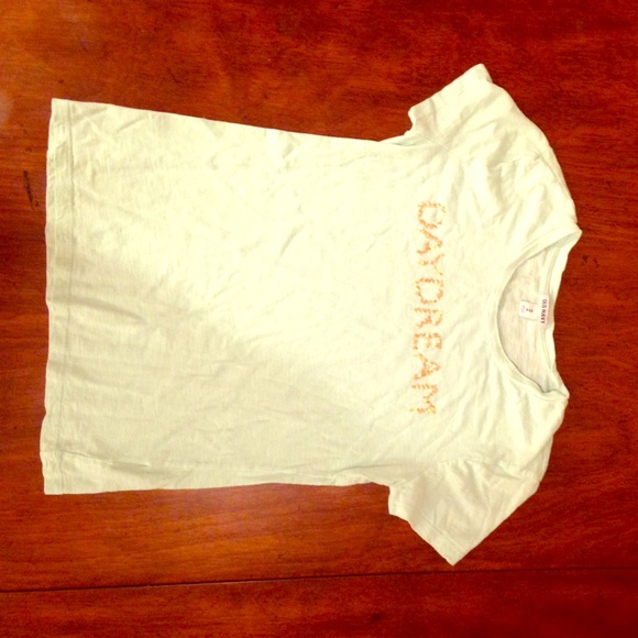 I am selling a turquoise t-shirt it has been used.