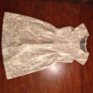 I am selling a black and white dress.