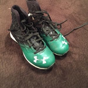 Green and black under armour football cleats size1