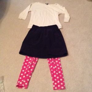 Three piece skirt top and leggings outfit.