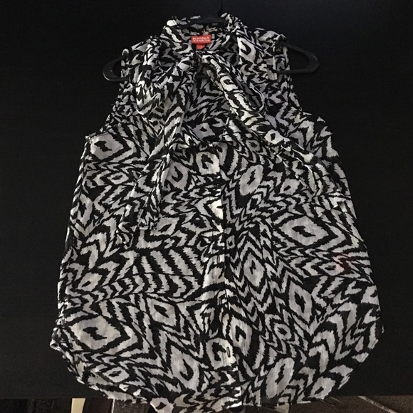 Sleeveless black and white shirt with bowtie