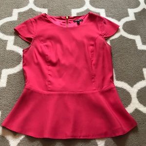 Express pink peplum shell.