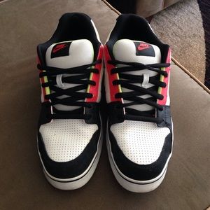 Pair of low top multi-colored Nikes size 13