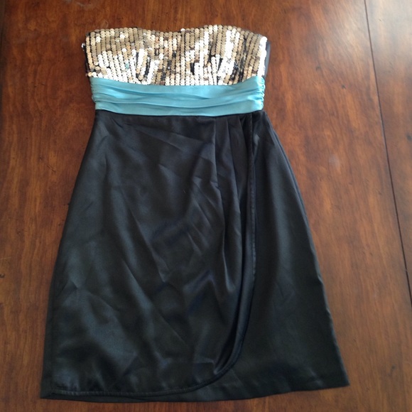 I am selling a silky black blue sparkly dress.