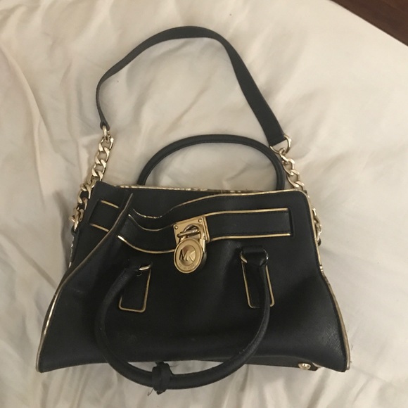 Michael Kors purse & matching wallet.