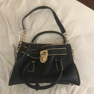 Michael Kors purse & matching wallet.