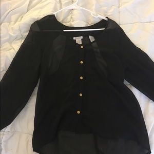 Sheer black blouse with cutout back