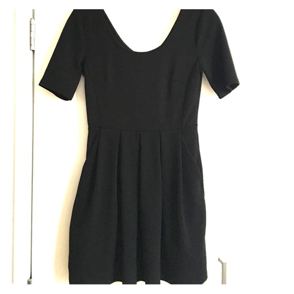 Black pleated with pockets above the knee dress