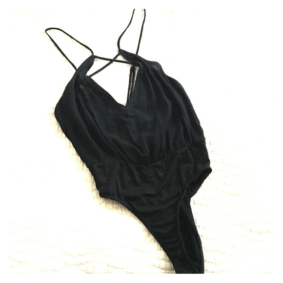 Black crisscrossing front and back body suit