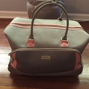 Tommy Bahama carry-on luggage.