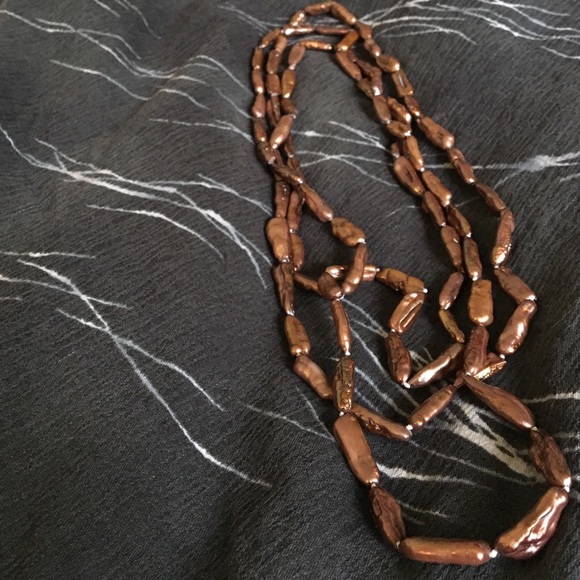 Long brown pearl necklace