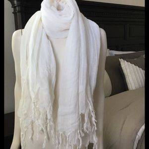 White scarf.              J