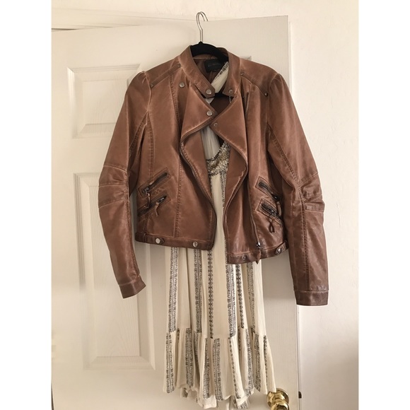 The dress and the leather jacket.