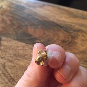 One Kate spade gold knot stud.