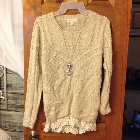 Tan sweater with lace trim. Never worn.