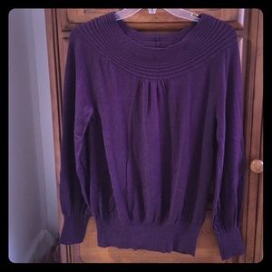 Purple sweater with detailing at the top