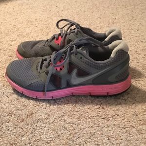 Pink and grey Nike lunarglide size 7