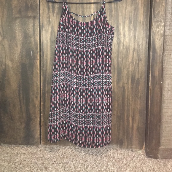 printed black dress with a cutout in back