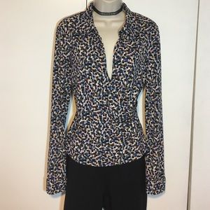 BCBG abstract print surplice top in EUC size L