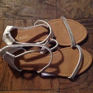 kourtney Burr white flip flop with zipper back