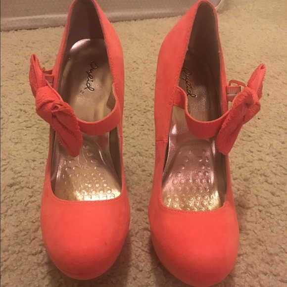 Coral heels with lace bow