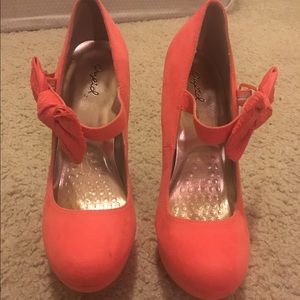 Coral heels with lace bow