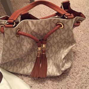 Beautiful MK logo bag with drawstring and tassel