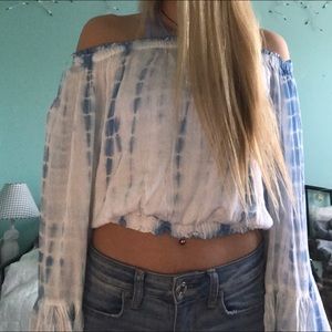 cropped, off the shoulder, long open sleeve top.