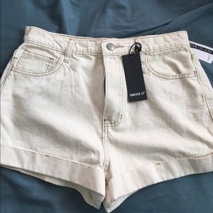 High-waisted light denim shorts