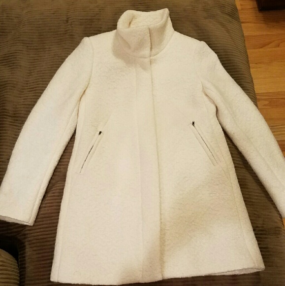 white funnel neck coat