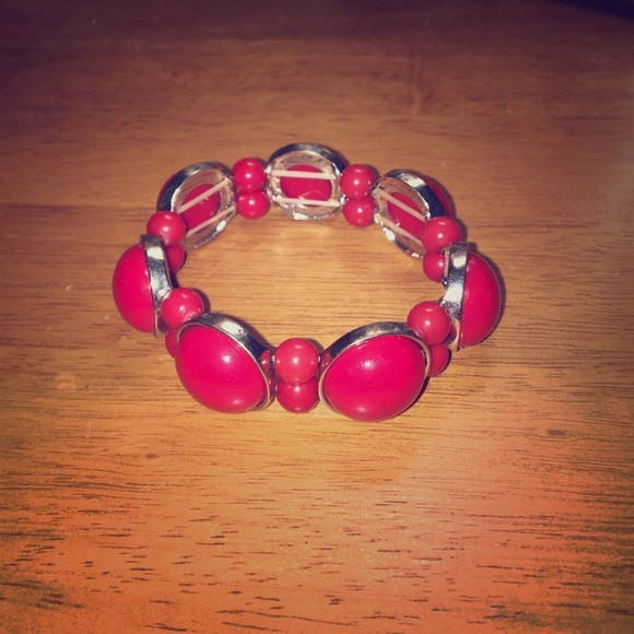 Red bobble bracelet.