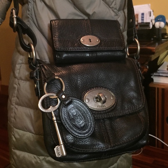 Fossil crossbody purse with matching wallet.