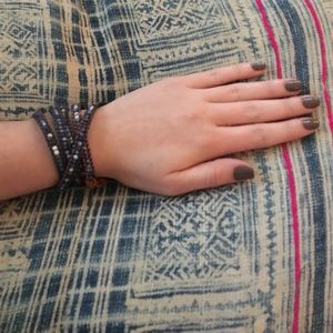 Brown corded, blue Chan Lulu beaded wrap bracelet